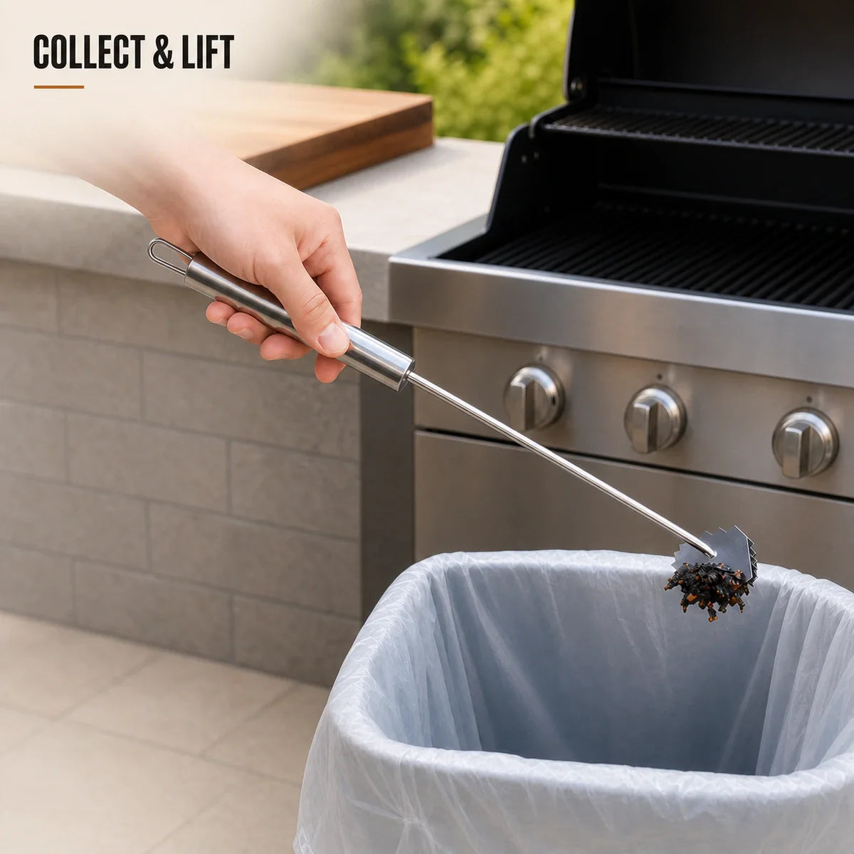 Long-handle grill scraper lifting collected residue into a lined bin