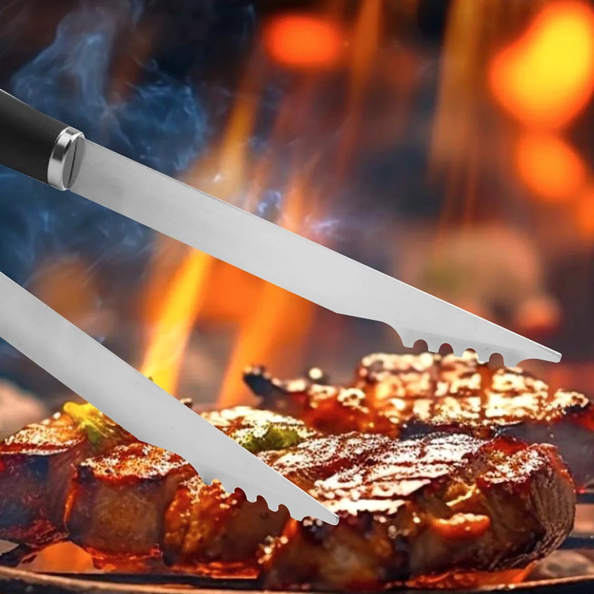 Long handle stainless steel grill tongs holding food on the barbecue